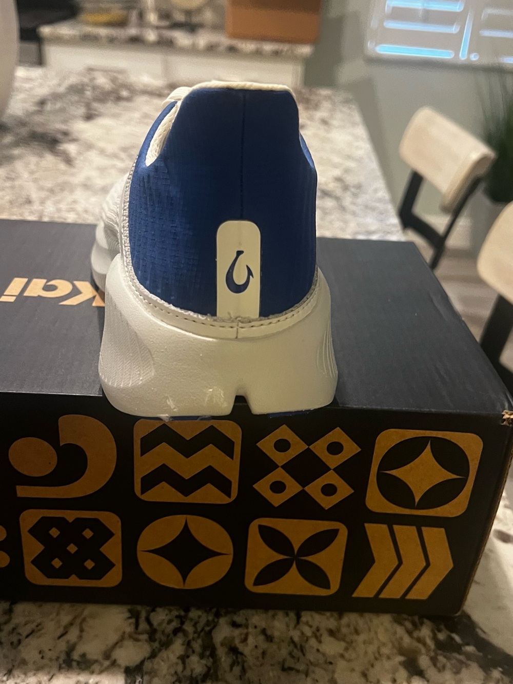OluKai Navy and White Slip-On Trainer